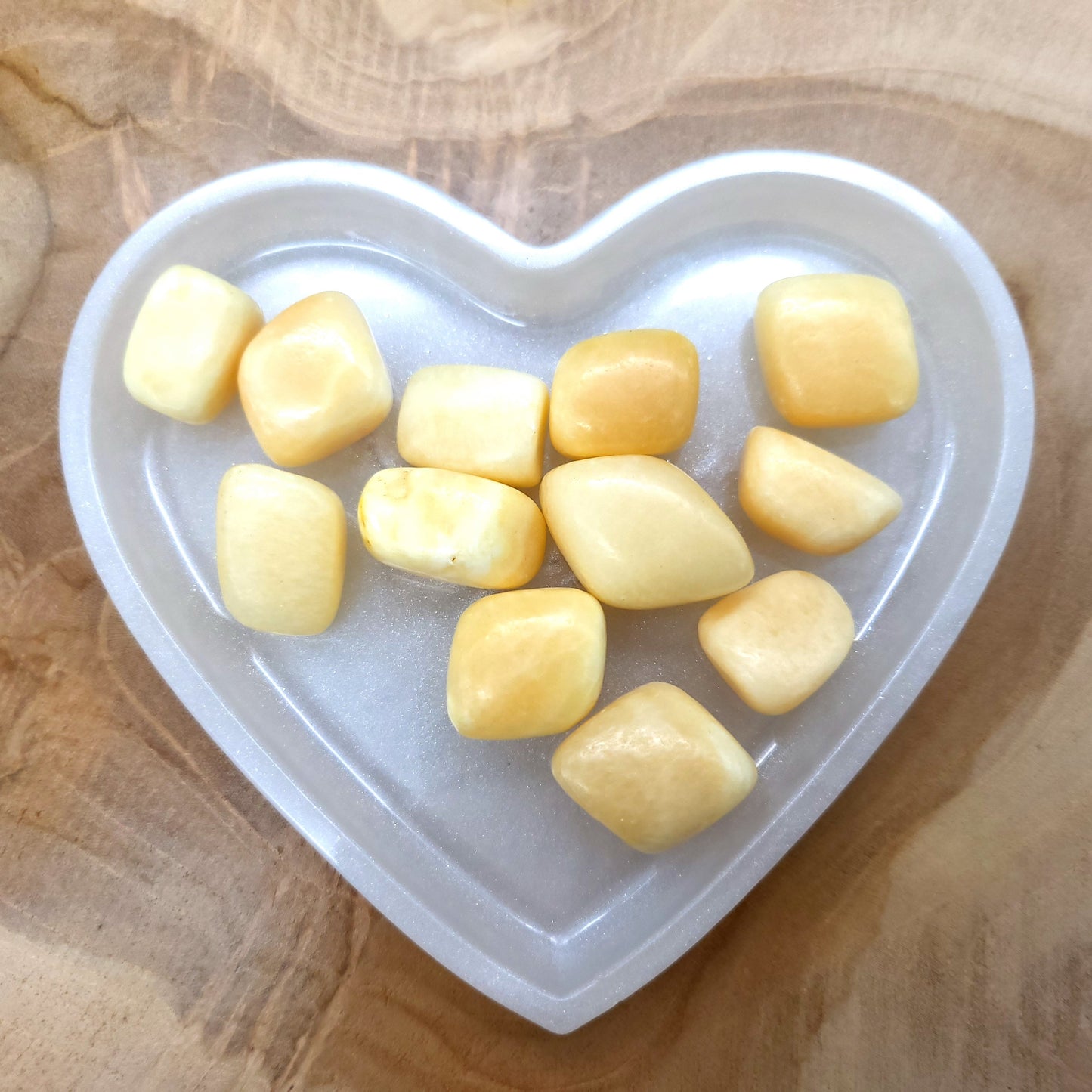 CALCITE JAUNE ou ORANGE EN PETITES PIERRES POLIES ET BRUTES