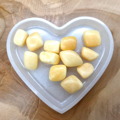 CALCITE JAUNE ou ORANGE EN PETITES PIERRES POLIES ET BRUTES